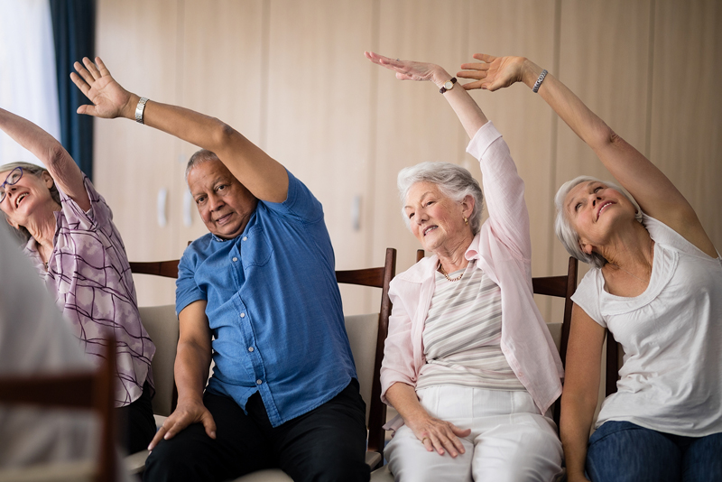 Seniors participating in a physical activity class
