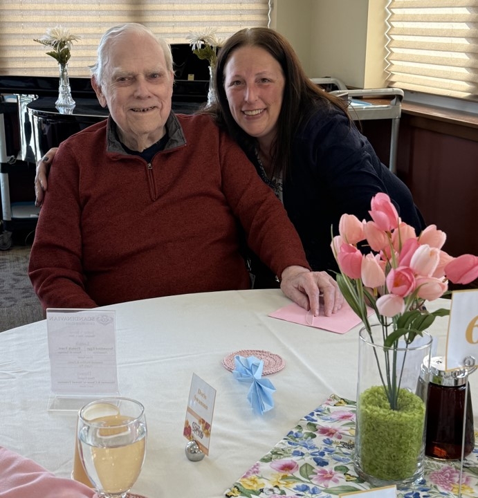 Resident and staff member sharing a moment