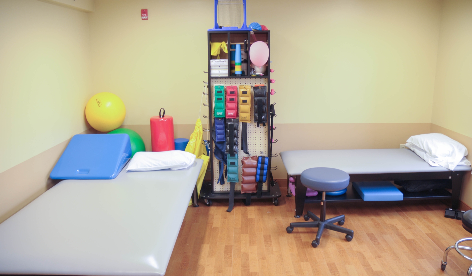 Therapy room with equipment and mats
