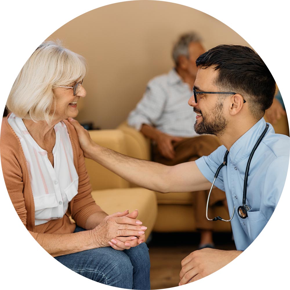 Caregiver interacting with an elderly resident.