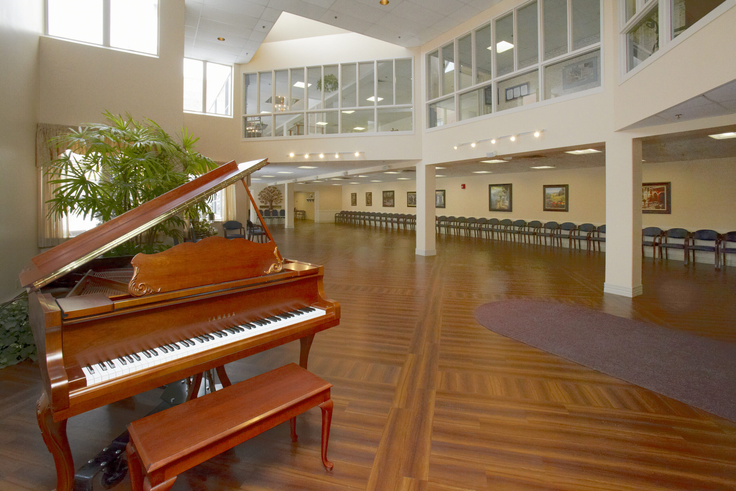 Interior view of a social space with a piano
