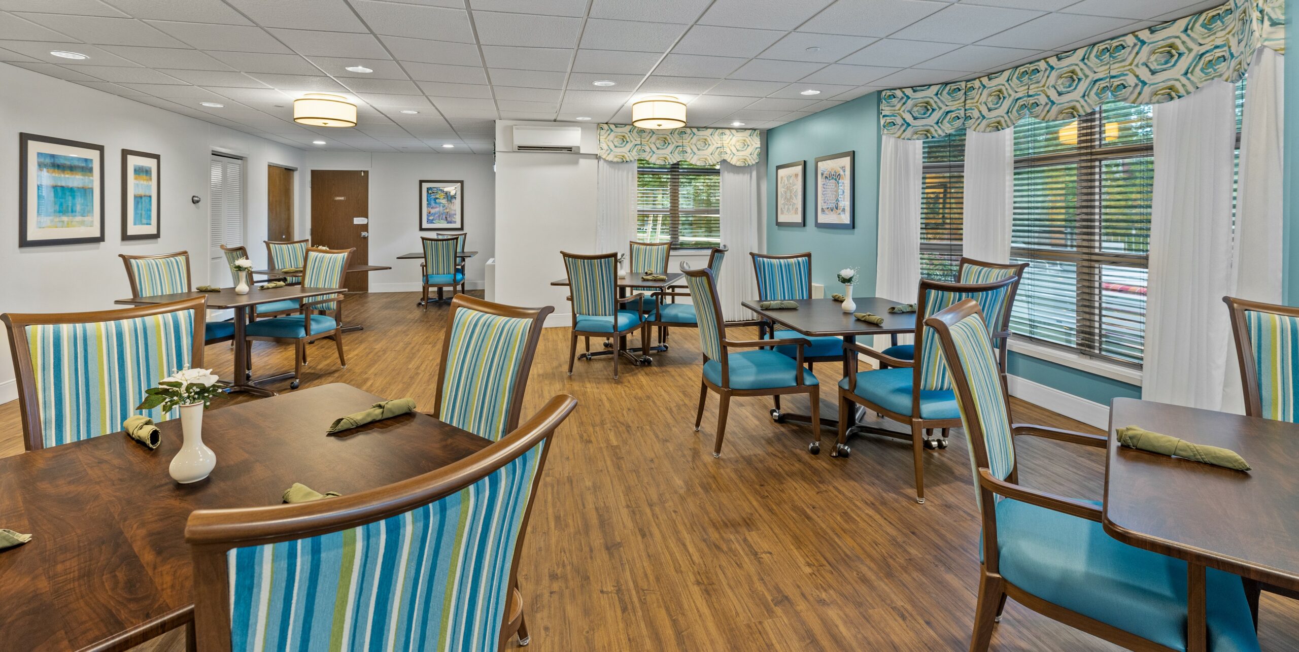 Dining area with blue and green decor.