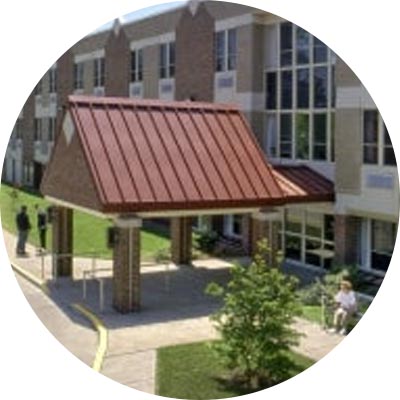Entrance with covered area and seating