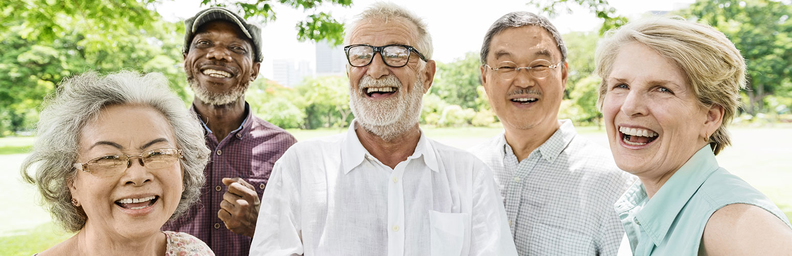 Group of happy seniors in an outdoor park
