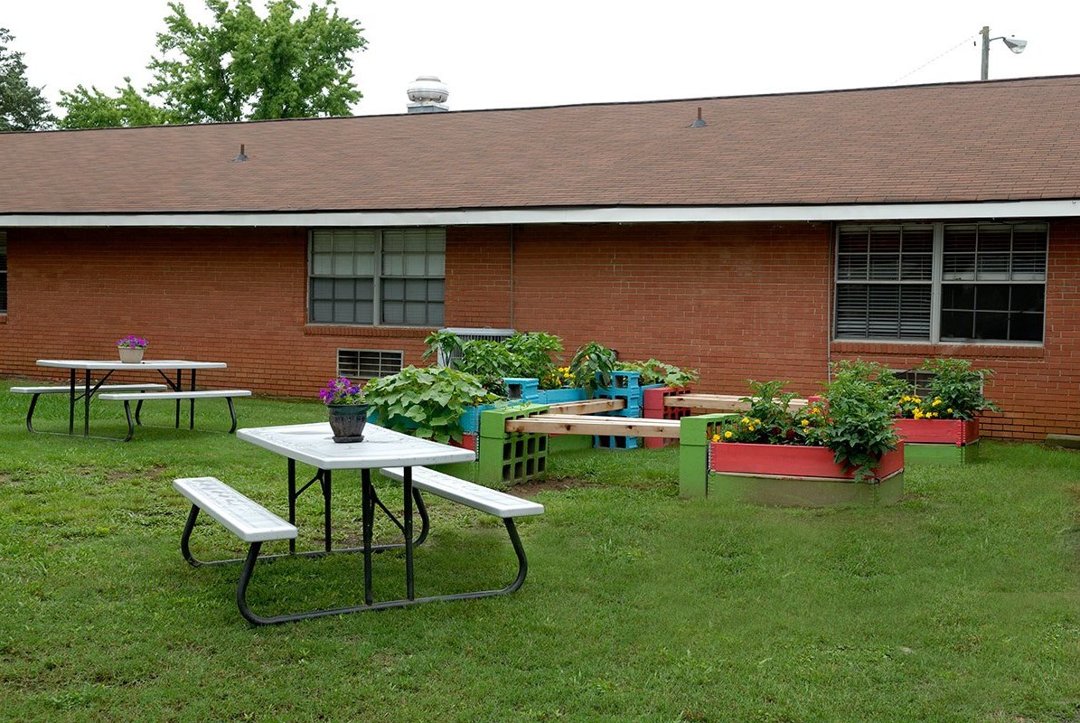 Garden area with raised flower beds and seating
