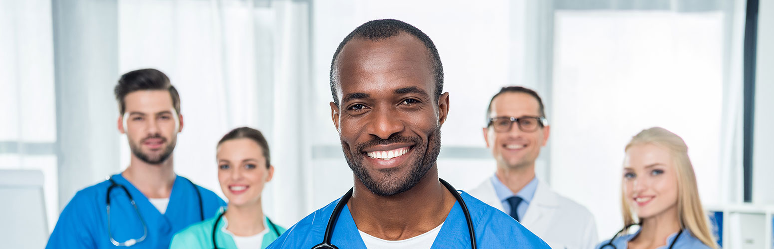 Smiling medical staff in a care facility