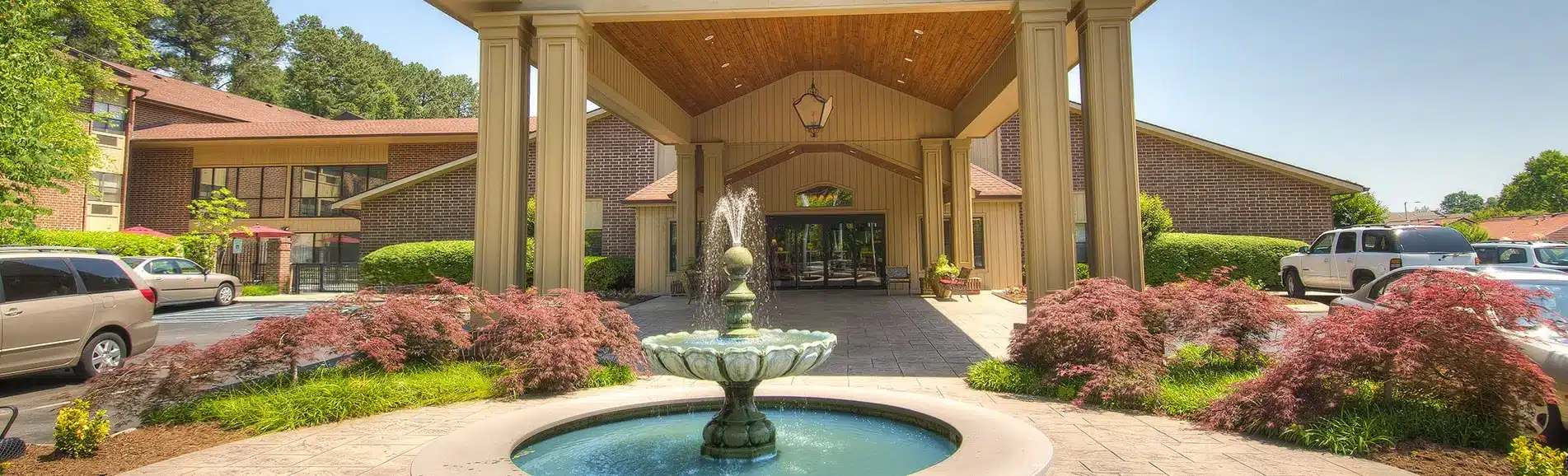 Front entrance of Hickory Valley Retirement with fountain