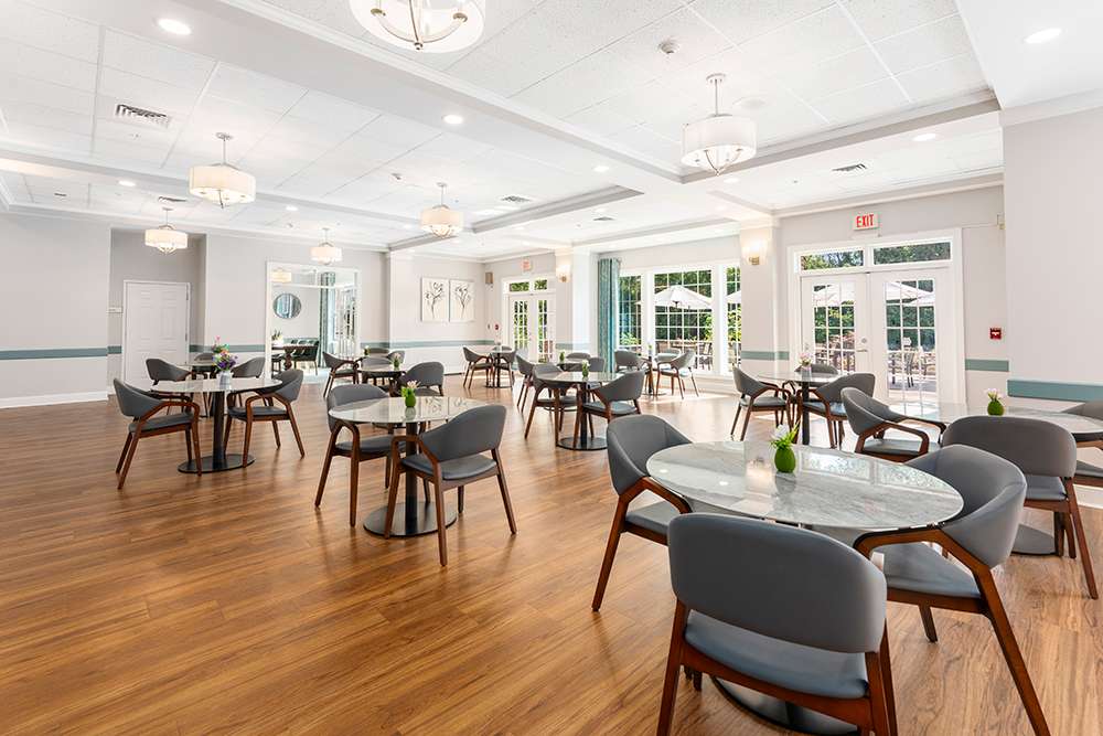 Bright dining area with tables and chairs
