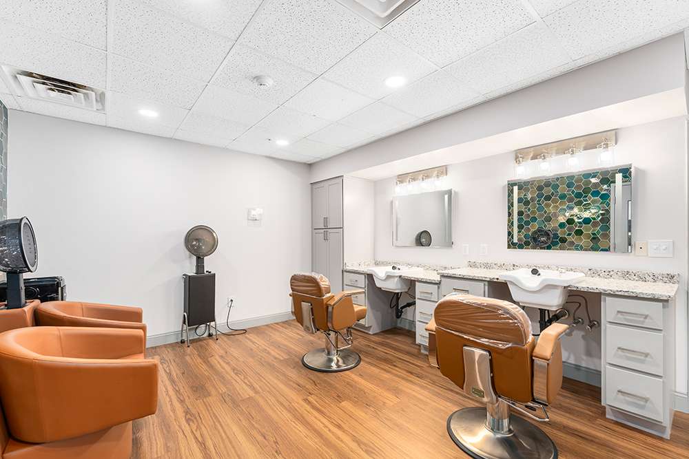 Hair salon with styling chairs and mirrors