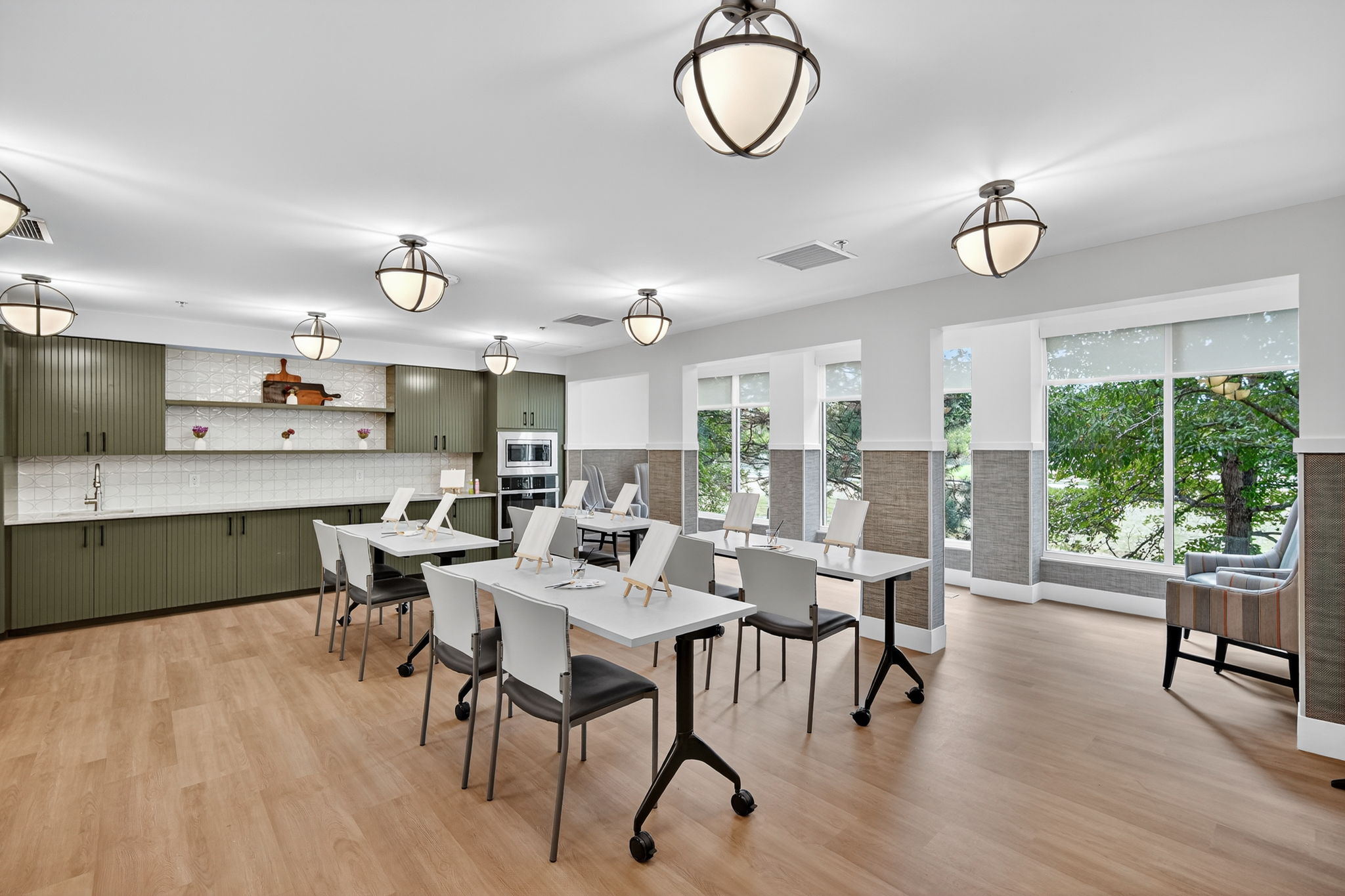 Bright common area with tables and chairs