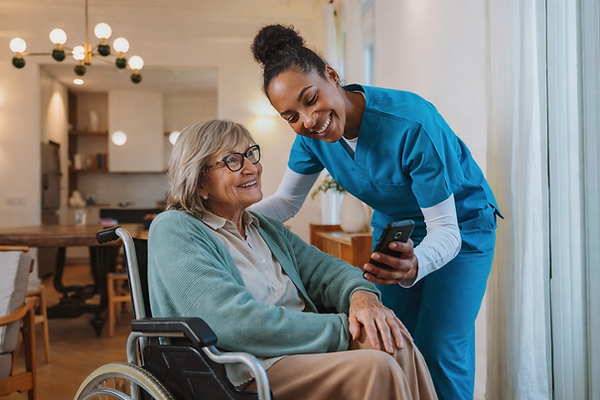 Senior resident enjoying time with staff member