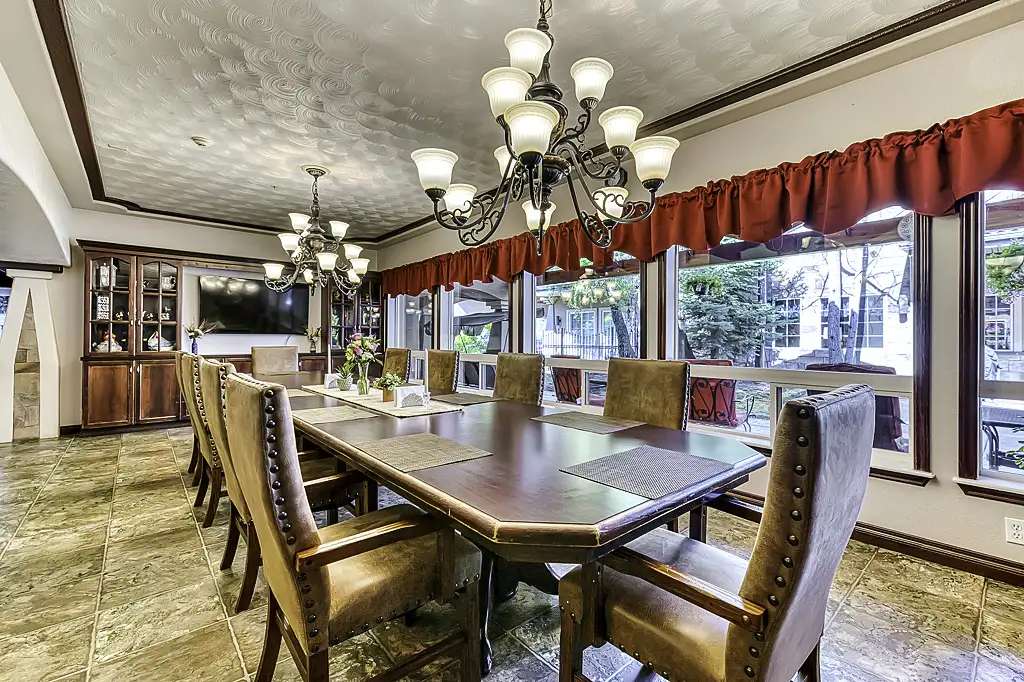 Elegant dining area with wooden table and chairs