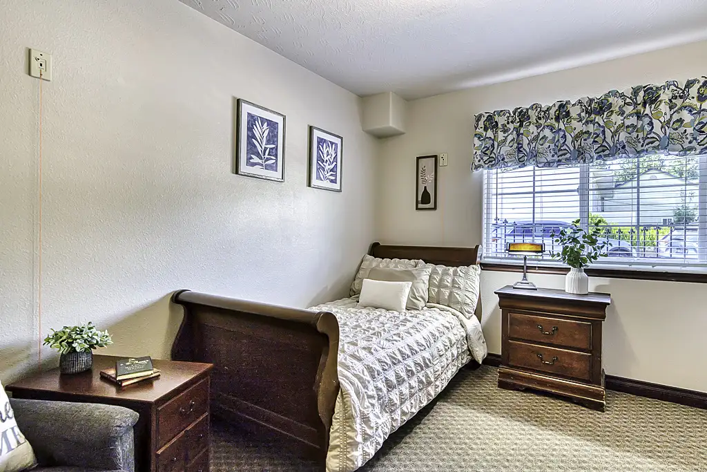 Cozy resident room with bed and decor