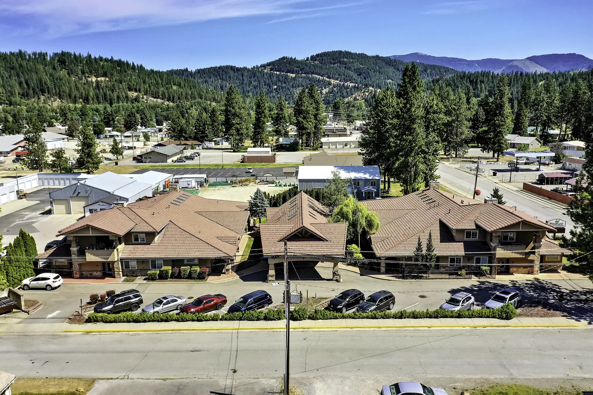 Aerial view of Pinehurst Senior Community facilities surrounded by nature