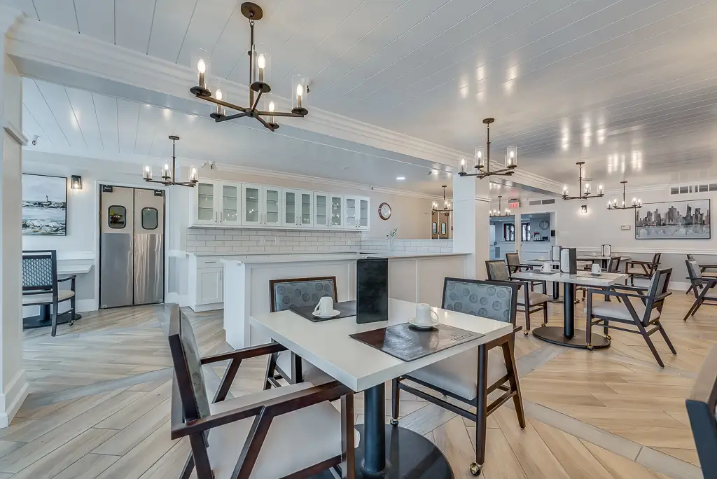 Bright dining area with tables and chairs