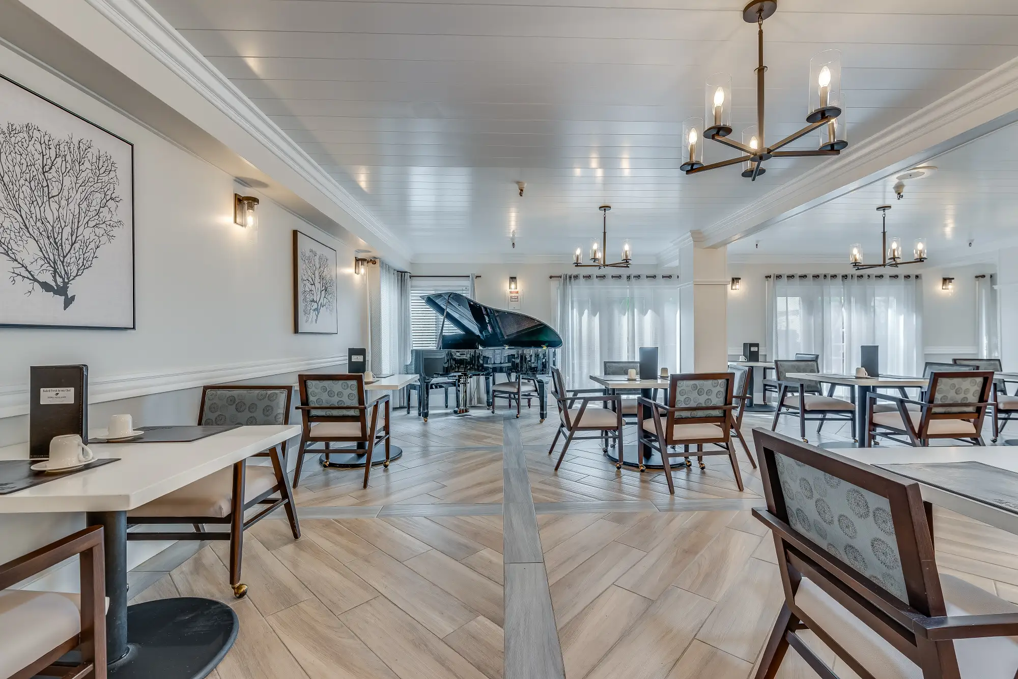 Bright dining room with piano and modern decor