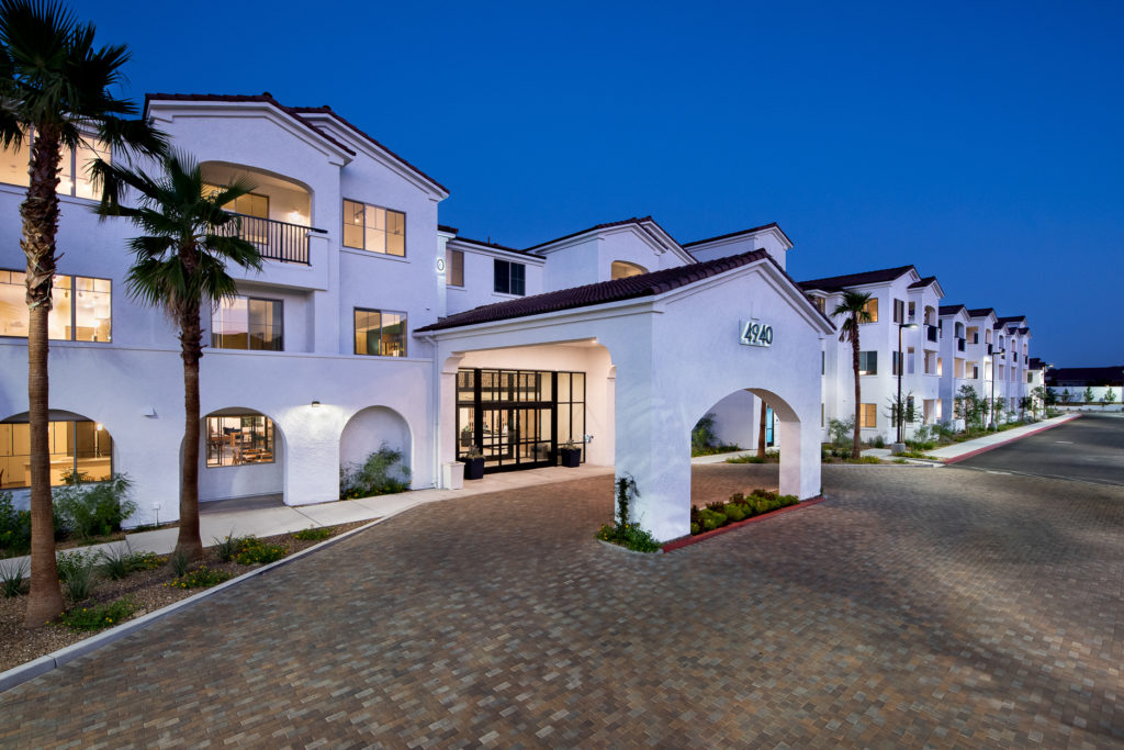 Exterior view of a nursing facility at dusk