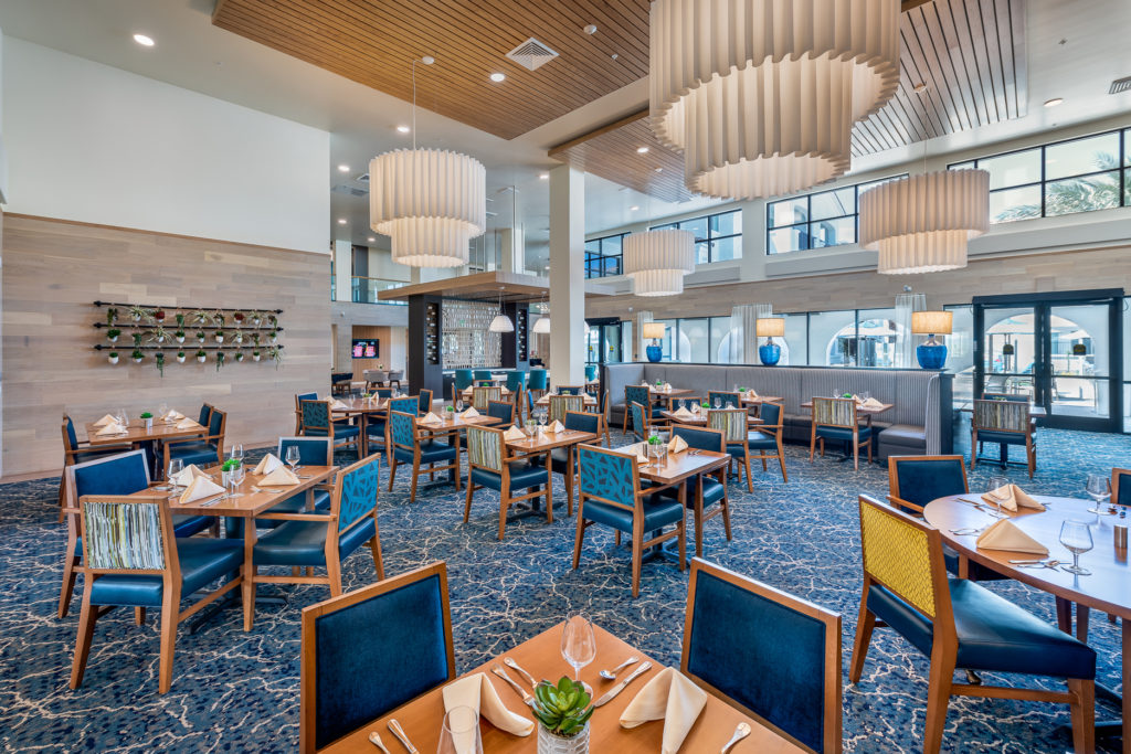 Elegant dining room setup with tables and chairs