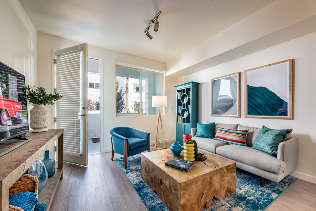 Brightly furnished living area with modern decor