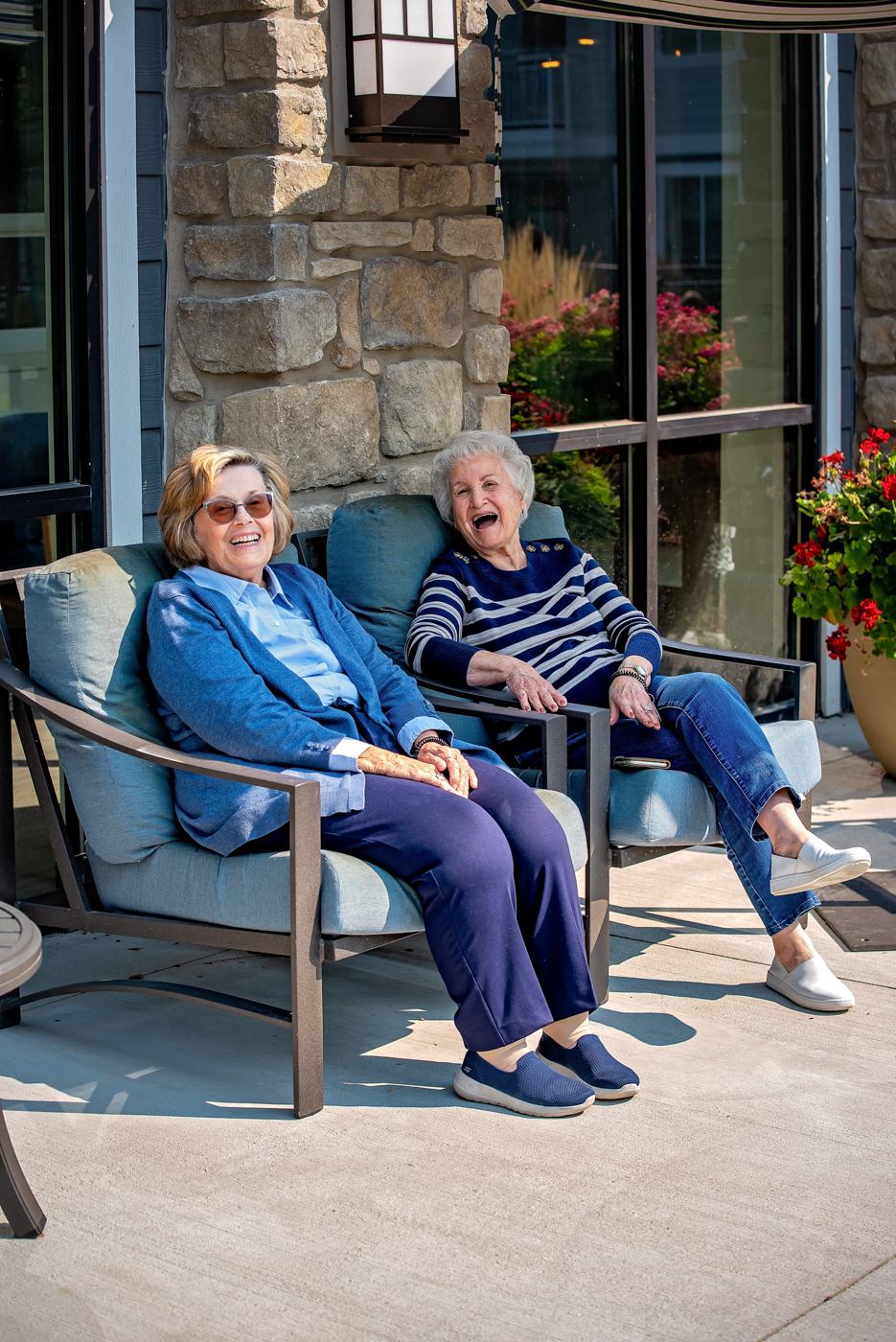 Two residents enjoying time together outside