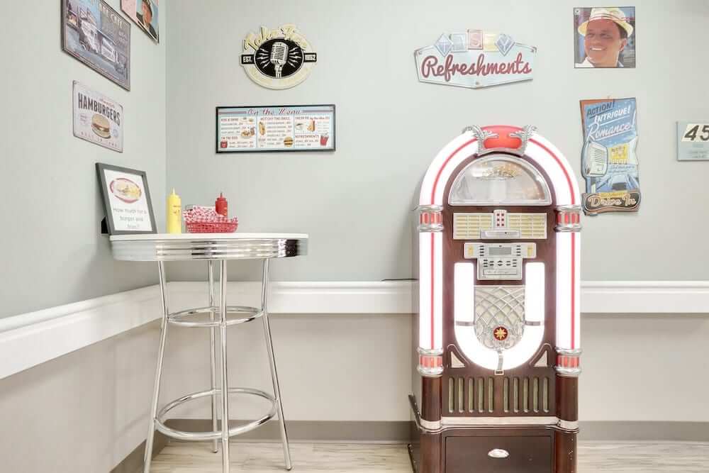 Retro jukebox in a common area with decor