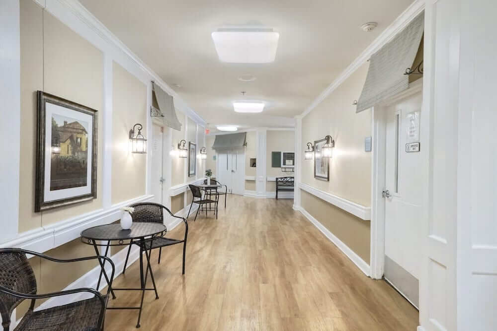 Bright interior hallway with seating and decorations