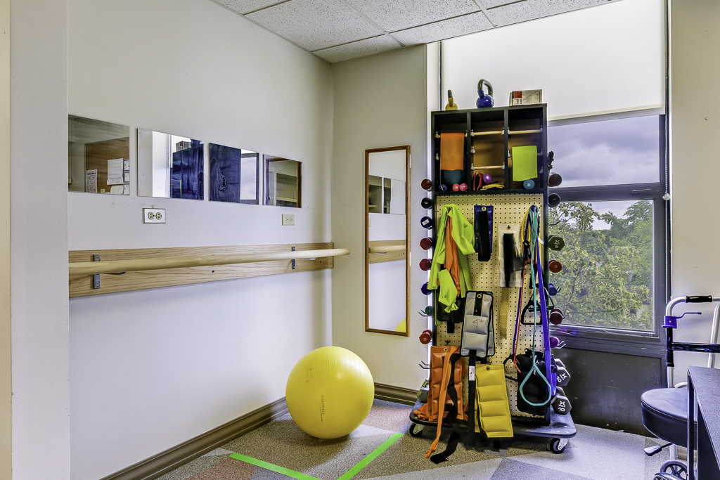 Therapy exercise equipment in a bright room