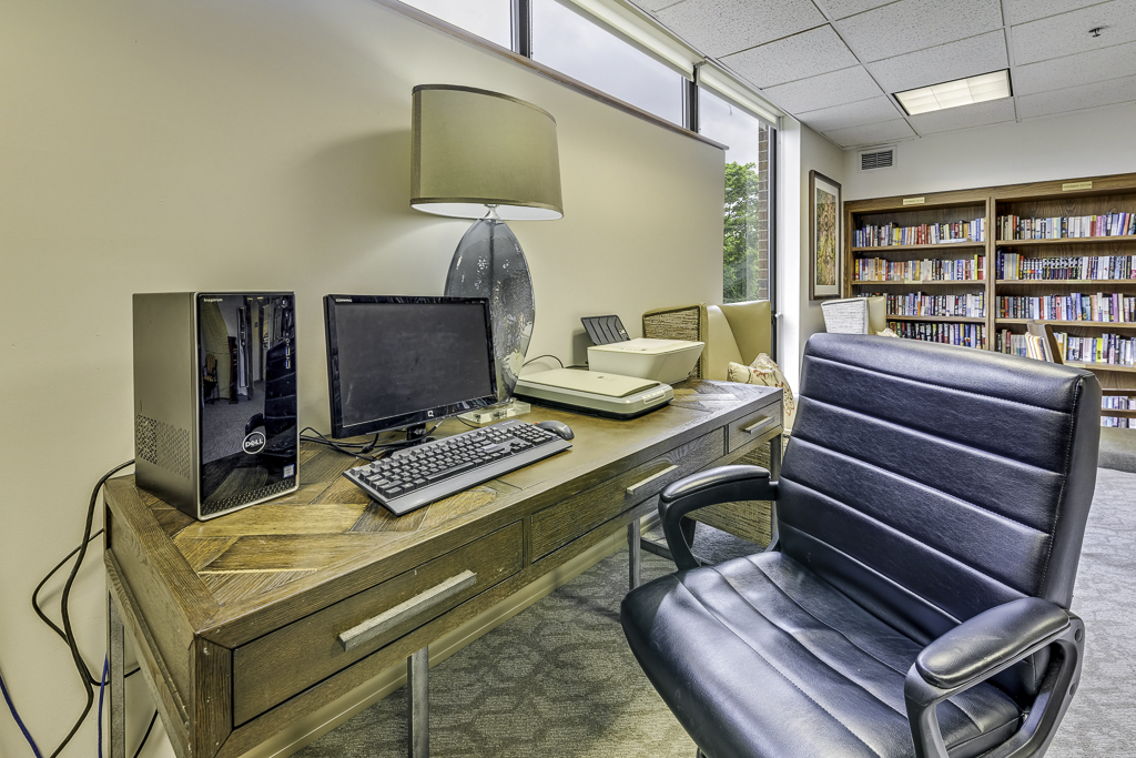 Interior desk area with a computer in a library