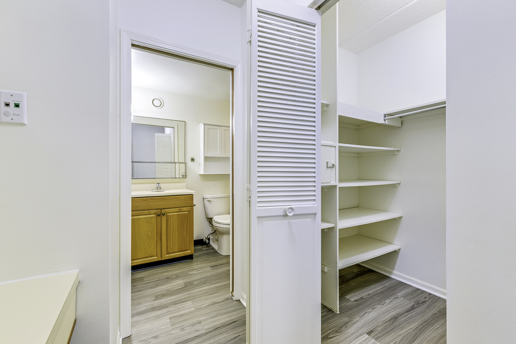Bright and spacious private resident bathroom with closet
