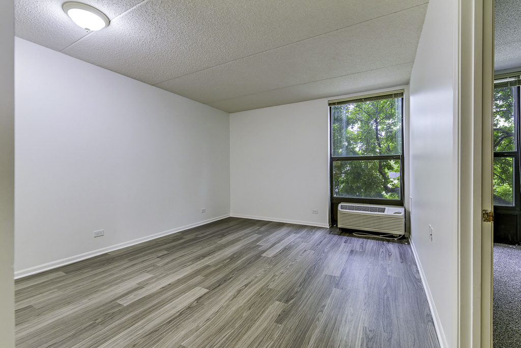 Bright and airy interior room with window