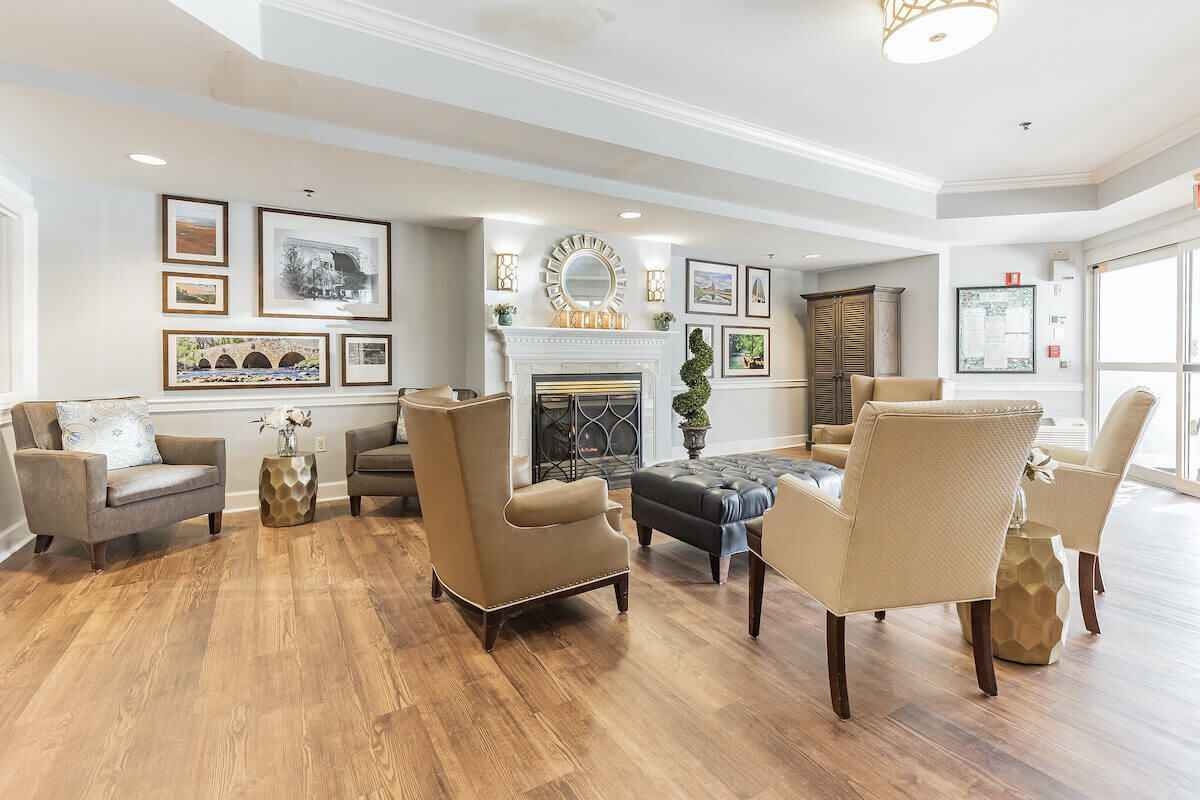 A well-furnished common area in a senior living facility
