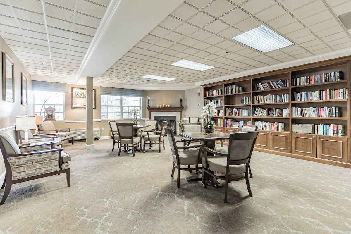 Common area with bookshelves and seating