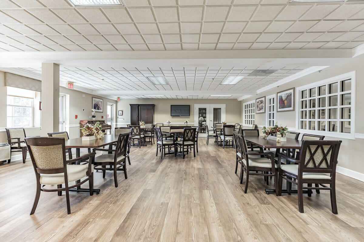 Dining room with tables and chairs arranged neatly