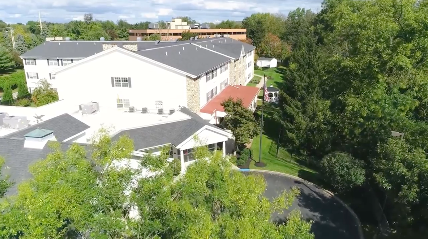 Aerial view of Rittenhouse Village At Portage with surrounding greenery