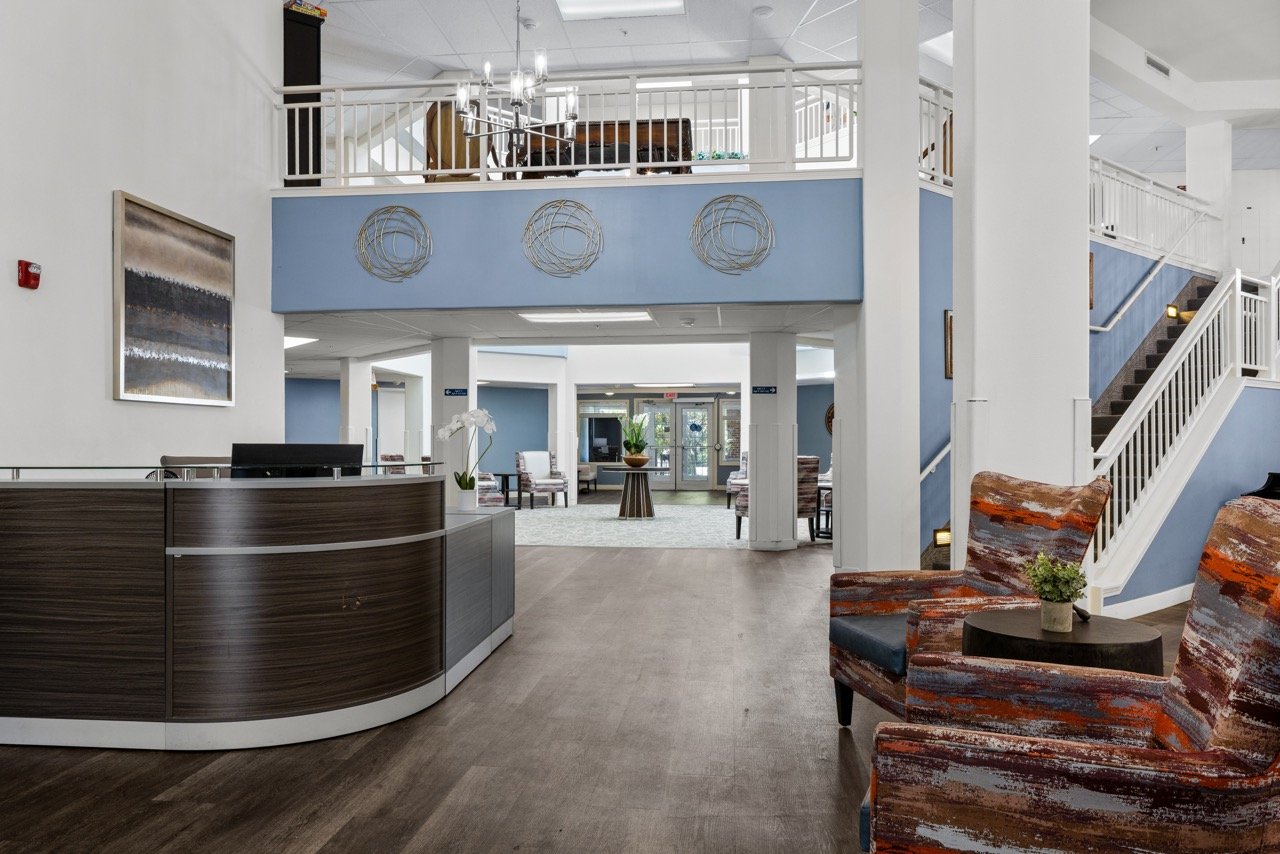 Bright interior lobby with seating and reception desk