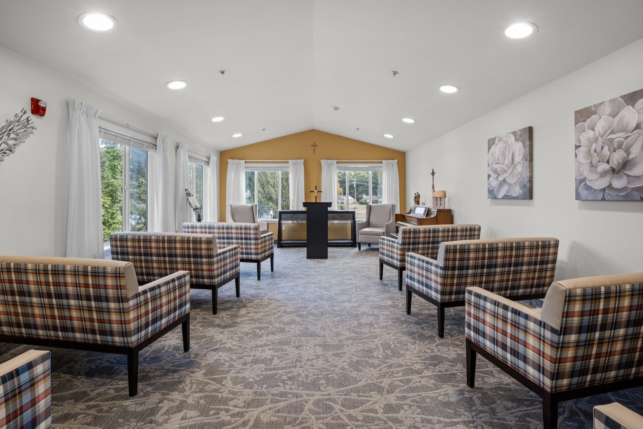 Bright interior common area with seating and decor