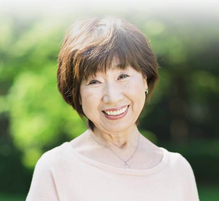 Smiling older woman in a natural outdoor setting
