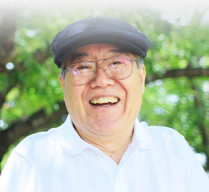 Smiling senior man outdoors in natural light