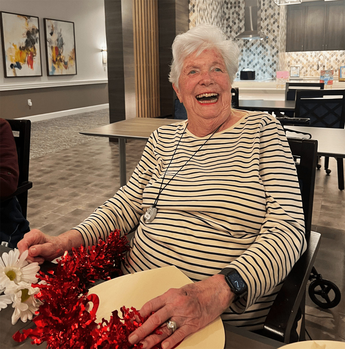 Resident enjoying an activity with decorations