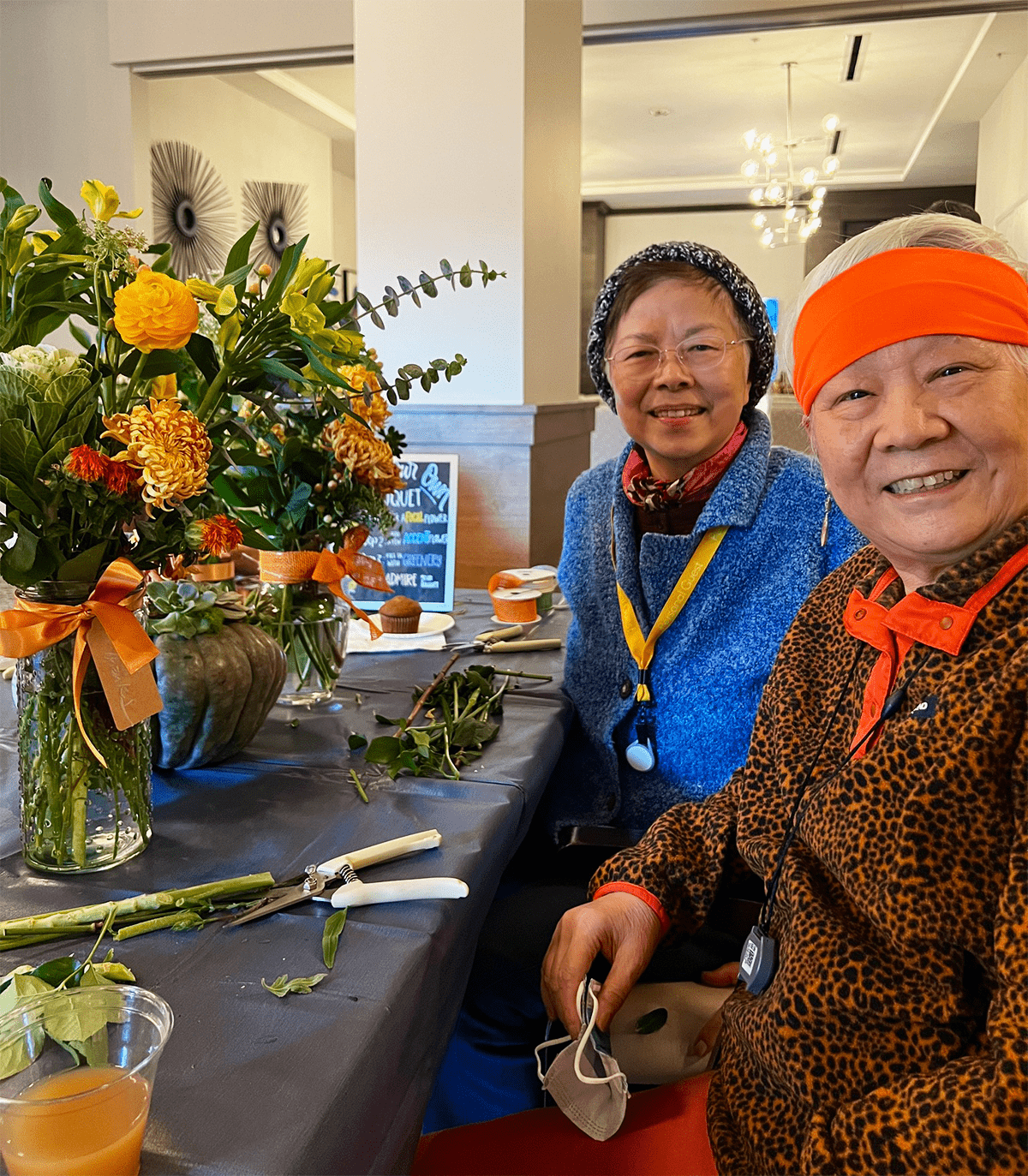 Residents enjoying an activity at a decorated table