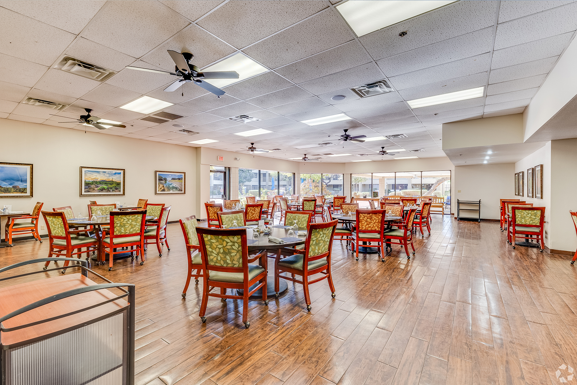 Bright dining room with tables and chairs