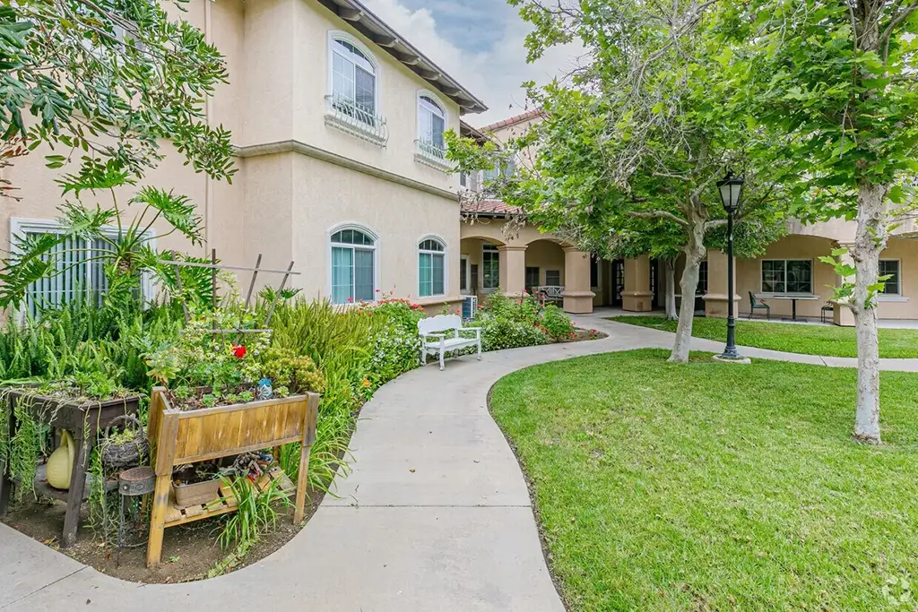 Pathway leading to the senior living facility with gardens