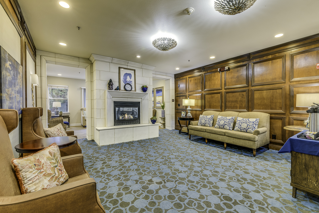 Interior common area with seating and fireplace