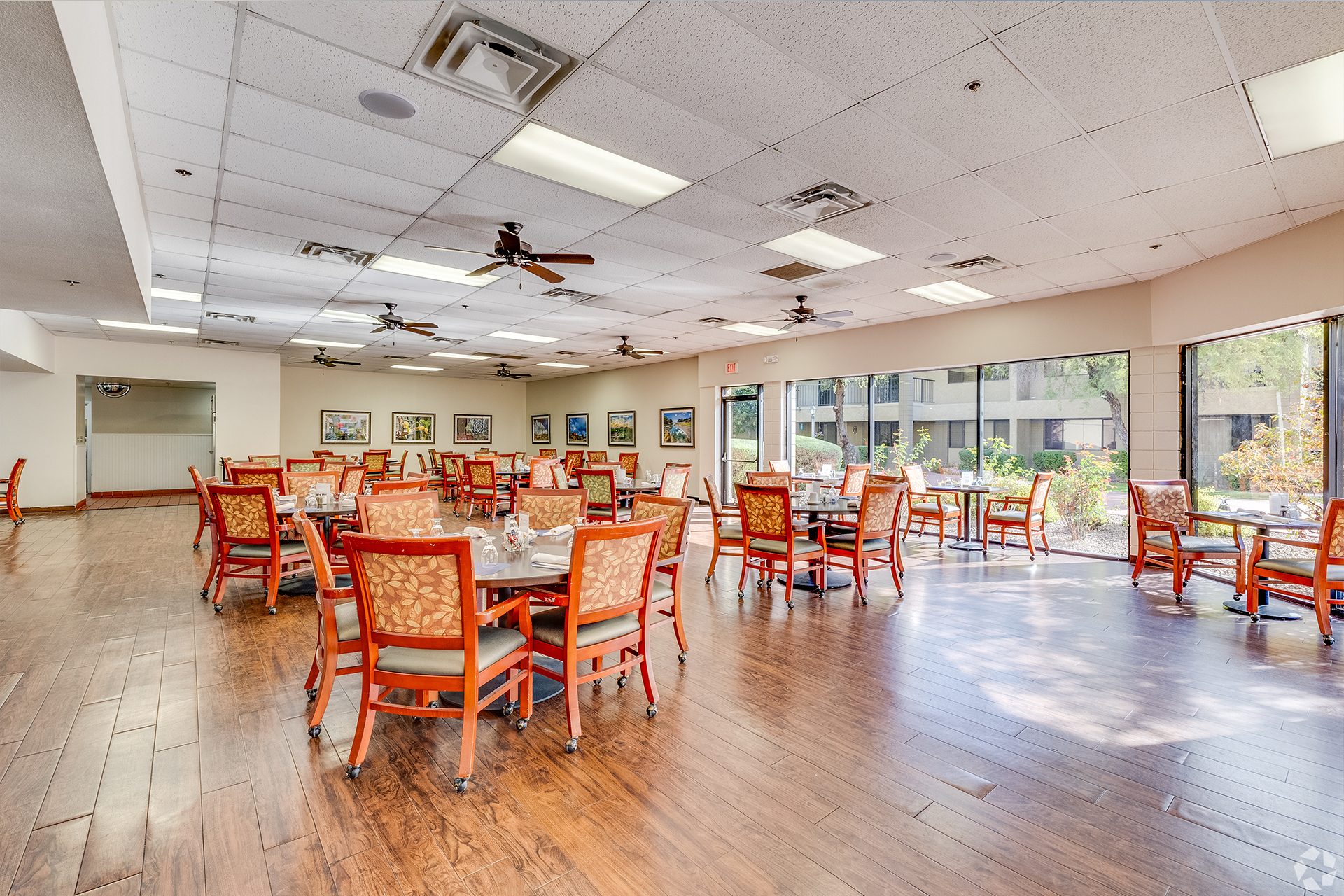 Bright dining room with tables and chairs