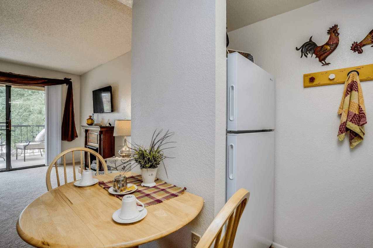 Cozy dining area in a resident room with food setup