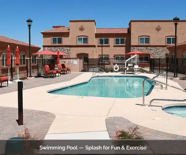 Swimming pool area with lounge chairs and umbrellas