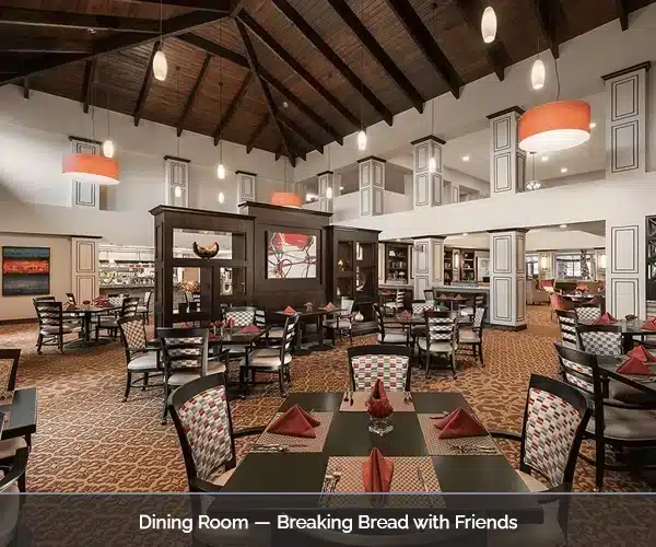 Bright dining room with tables set for friends
