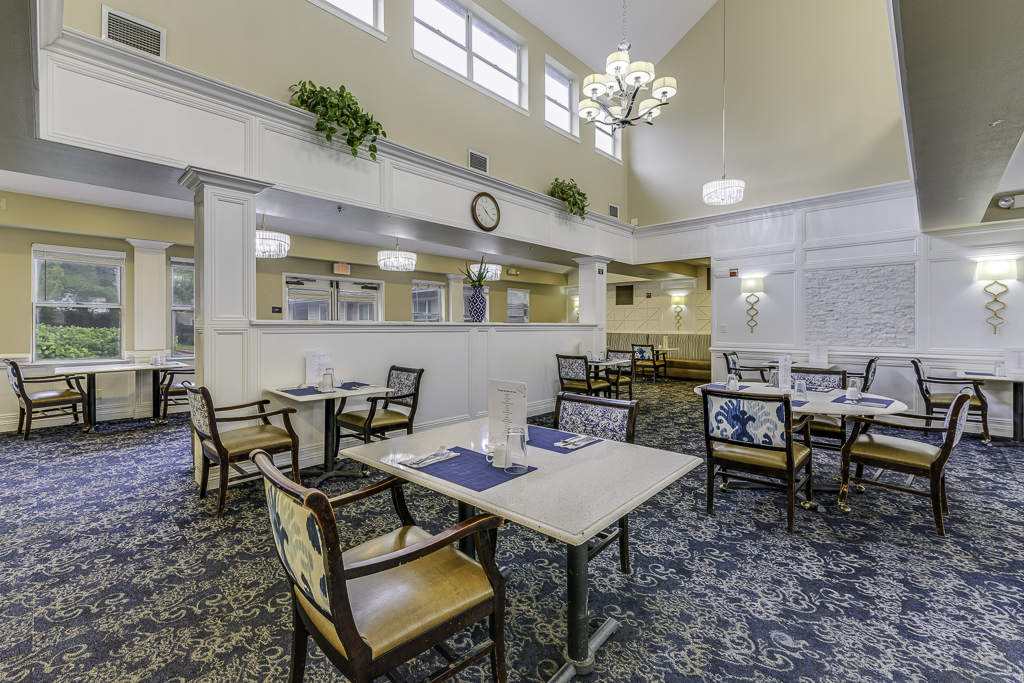 Bright dining area with tables and chairs
