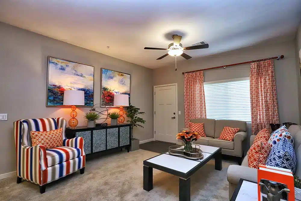 Brightly decorated common area with seating and art