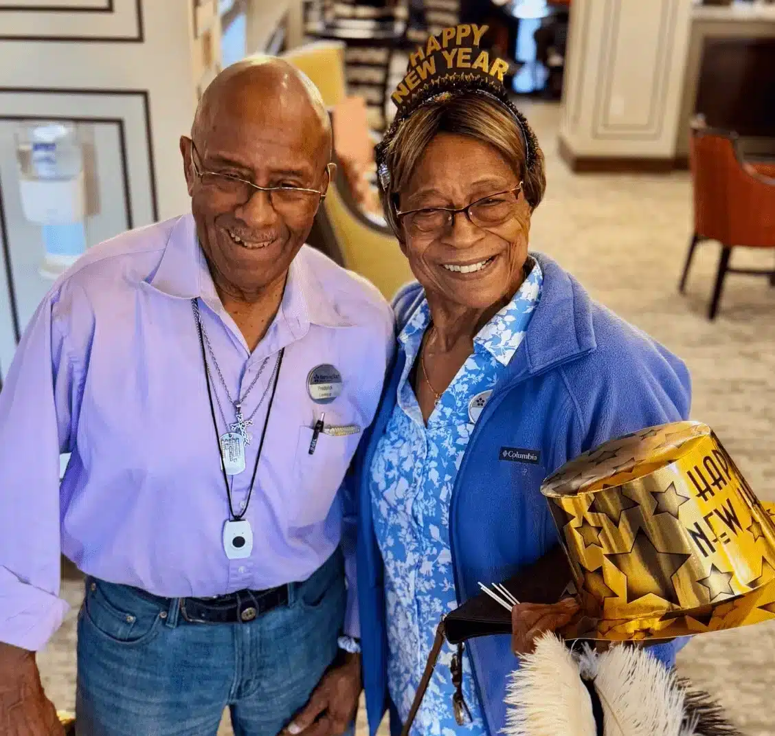 Two residents celebrating New Year's Eve in the common area